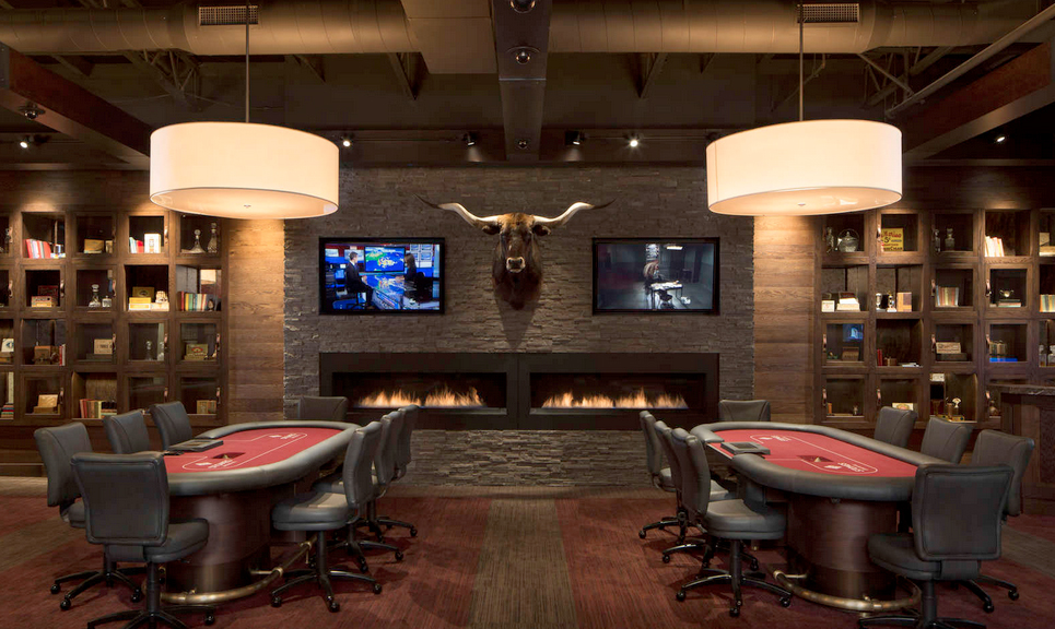 Flat Screen TVs installed on Stacked Stone Wall in a Casino
